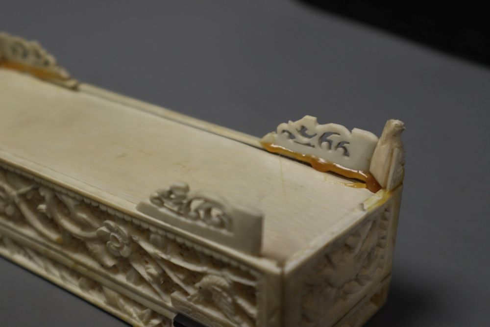 A 19th century Chinese ivory box, with finely carved and pierced detail, 18.5cm